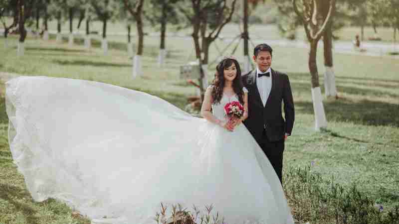 A charming outdoor wedding portrait of a smiling bride and groom on a sunny day., tags: die fdb awards 2025 - pexel